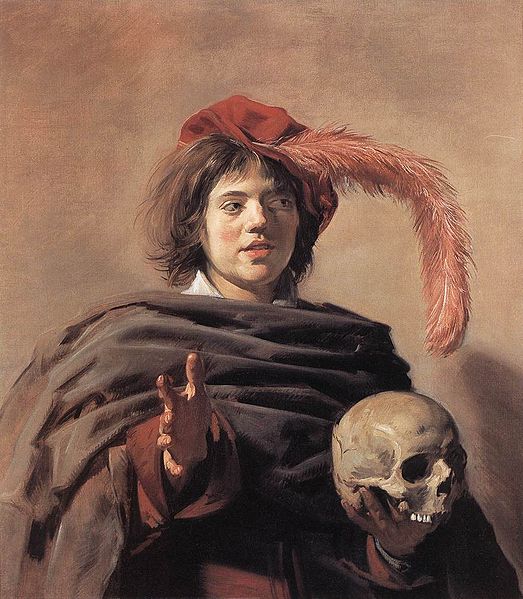 Young Man holding a Skull